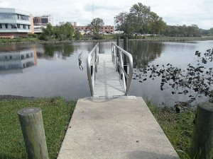 Floating dock with handrails